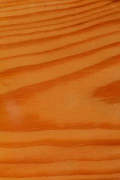 The surface of a rectangular wooden board with wavy lines. Stock Photos