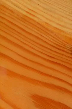 The surface of a rectangular wooden board with wavy lines. Stock Photos