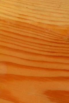 The surface of a rectangular wooden board with wavy lines. Stock Photos