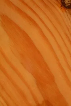 The surface of a rectangular wooden board with wavy lines. Stock Photos