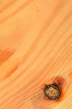 Surface of a rectangular wooden board with wavy lines and a knot Stock Photos