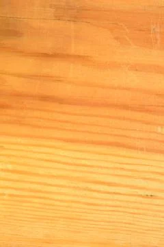 The surface of a rectangular wooden board with wavy lines. Stock Photos