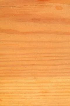 The surface of a rectangular wooden board with wavy lines. Stock Photos