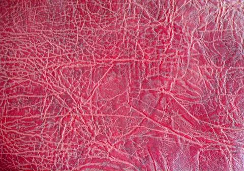 The surface of red leather as background Stock Photos