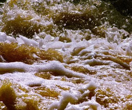 Surface of river with foam Stock Photos