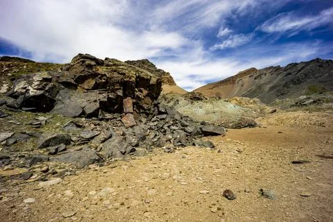 Surface of rocks with sedimented debris over time. Martian landscape. Stock Photos