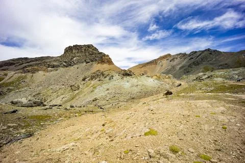 Surface of rocks with sedimented debris over time. Martian landscape. Stock Photos