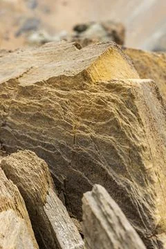 Surface of rocks with sedimented debris over time. Martian landscape. Stock Photos
