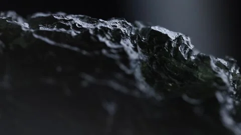 Surface of a rotating asteroid. Rough meteorite rock close up Stock Footage 294313249