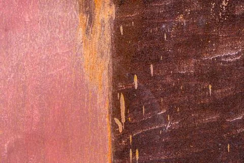Surface of rusty iron with remnants of old paint, texture, background Stock Photos