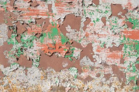 Surface of rusty iron with remnants of old paint texture background Stock Photos