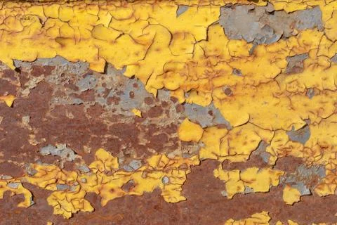 Surface of rusty iron with remnants of old paint texture background Stock Photos