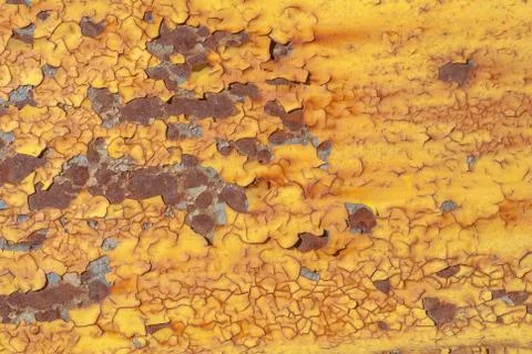 Surface of rusty iron with remnants of old paint, texture background Stock Photos