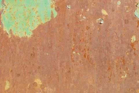 Surface of rusty iron with remnants of old paint, texture background Stock Photos
