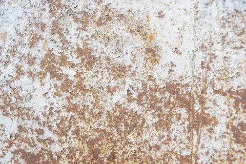 Surface of rusty iron with remnants of old paint, texture background Stock Photos
