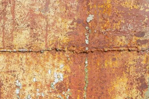 Surface of rusty iron with remnants of old paint, chipped paint, texture back Stock Photos