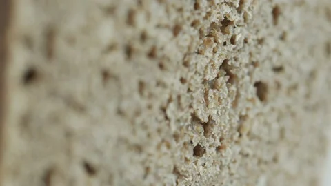 Surface of rye bread slice 4K video Stock Footage 171606133