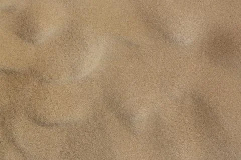 Surface of sand with small troughs Stock Photos