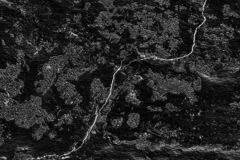 Surface with scratches on dark gray background Stock Photos