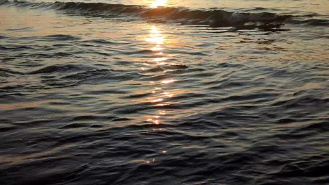 The surface of the sea waves with a sun path in the morning at sunrise Stock Footage 328427346