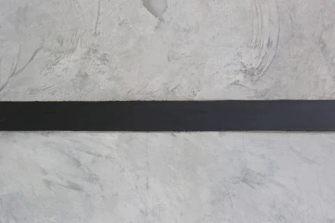 Surface of Smooth gray cement wall texture background and there is a black .. Stock Photos