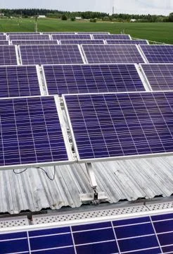 Surface of the a solar panel on field Stock Photos