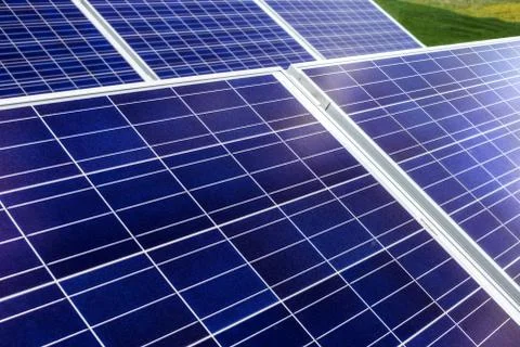 Surface of the a solar panel on field Stock Photos