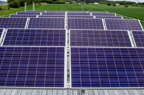 Surface of the a solar panel on field Stock Photos