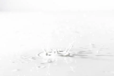 Surface with splashes milk Foto stock