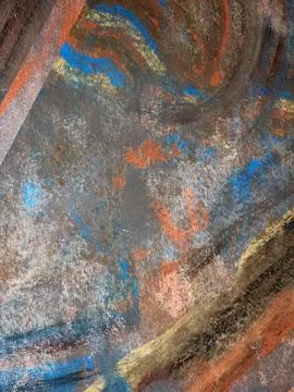 Surface stained with colored paints. Wall smeared with paint. Abstractionism Stock Photos