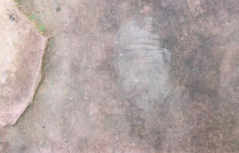 Surface of the stone and footprints Stock Photos