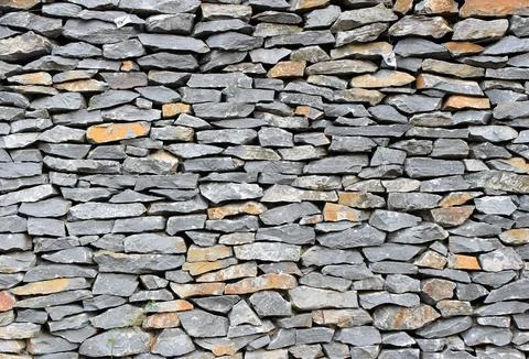 Surface of the stone wall background Stock Photos