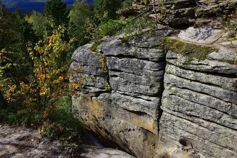 The surface structure of quartz sandstone rocks from the town of Kamenny Goro Stock Photos