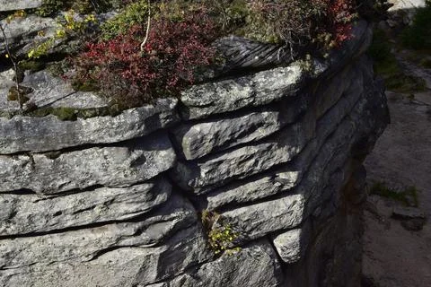 The surface structure of quartz sandstone rocks from the town of Kamenny Goro Stock Photos