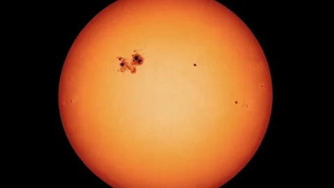 Surface of the Sun with active regions and dark spots. Stock Footage 311381218