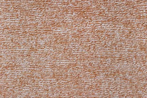 The surface of the sweater is made of mixed wool yarn of white-orange-brown Stock Photos