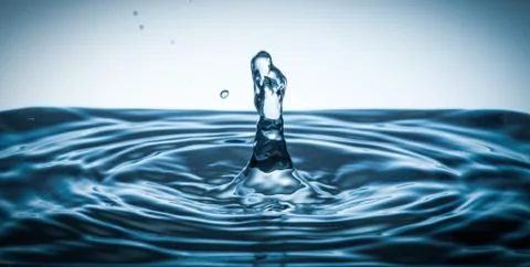 Surface tension with drop in the center Stock Photos