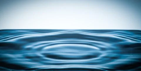 Surface tension of a liquid with concentric circles Stock Photos