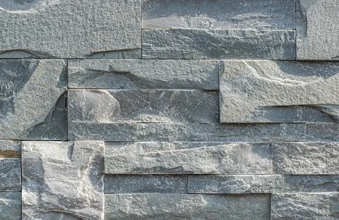 Surface texture composed of black chipped stone Stock Photos