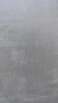 Surface texture displays subtle patterns in a muted gray tone with intricat.. Stockfoto's