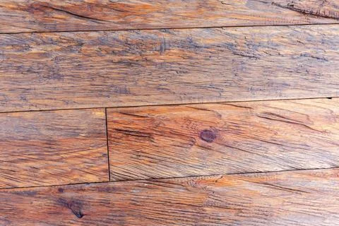 Surface texture of lined with angled roughly processed solid planks Stock Photos