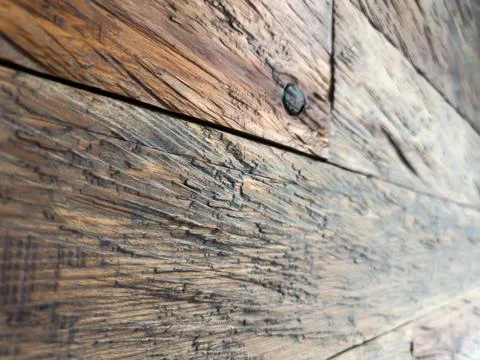 Surface texture of lined with horizontal roughly processed solid planks Stock Photos