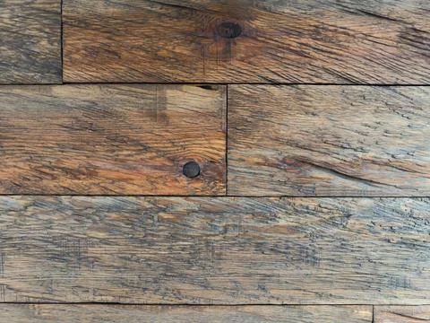 Surface texture of lined with horizontal roughly processed solid planks Stock Photos