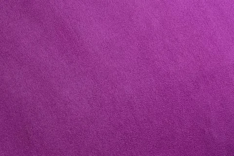 Surface texture of pink suede leather close-up. Stock-Fotos