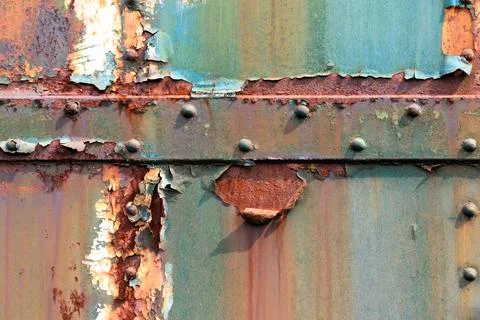 Surface texture of rust and peelling paint on metal Stock Photos