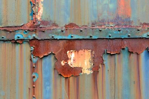 Surface texture of rust and peelling paint on metal Stock Photos