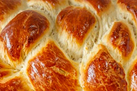 Surface texture of sweet braided bread Stock Photos