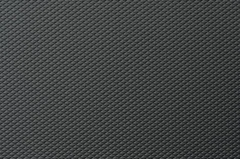 Surface with a textured pattern in dark color and simple design Stock Photos