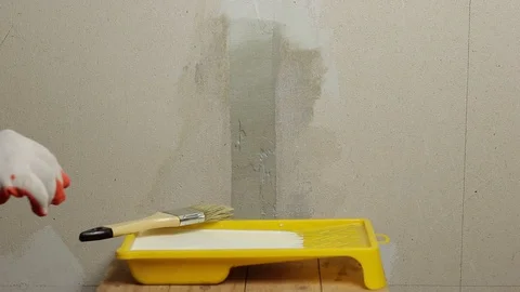 Surface treatment of the wall Stock Footage 129697341