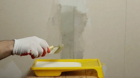 Surface treatment of the wall Stock Footage 129697411